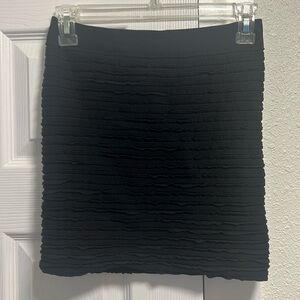 Bebe Black Skirt. Never worn. Without tag.